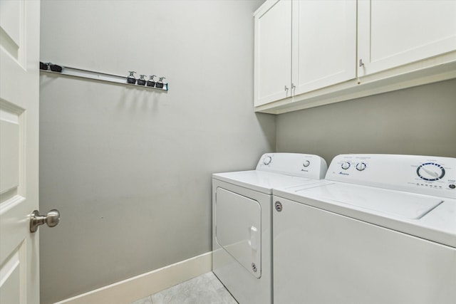 1004 Enid St Unit B, Houston, TX 77009 - laundry room featuring independent washer and dryer, cabinet space, and baseboards