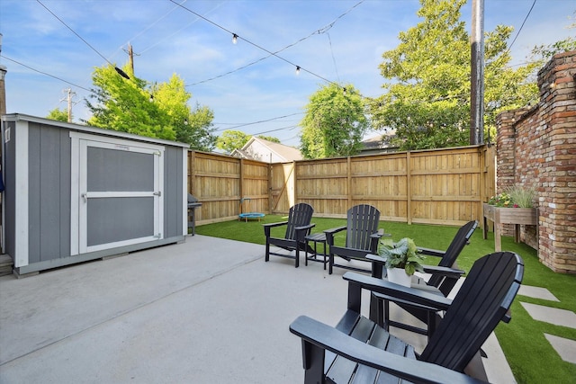 1004 Enid St Unit B, Houston, TX 77009 - view of patio / terrace with a storage unit, a fenced backyard, and an outdoor structure
