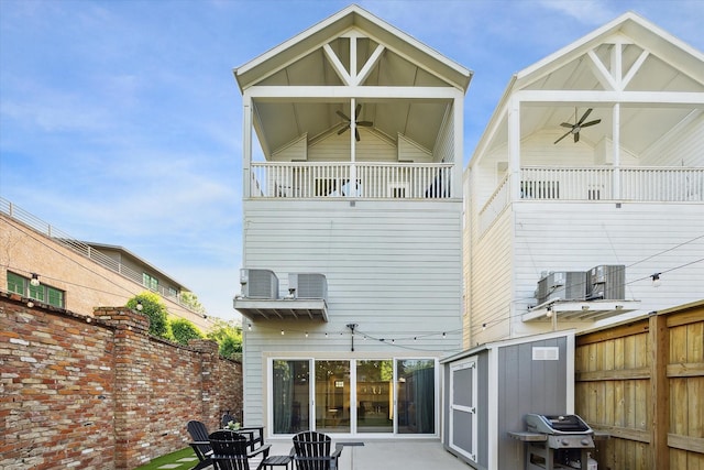 1004 Enid St Unit B, Houston, TX 77009 - rear view of property with fence, central AC, a shed, and an outdoor structure