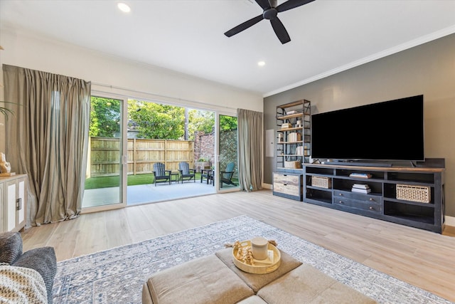 1004 Enid St Unit B, Houston, TX 77009 - living area with wood finished floors, ornamental molding, a ceiling fan, recessed lighting, and baseboards