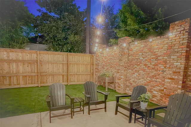 1004 Enid St Unit B, Houston, TX 77009 - patio at twilight with fence