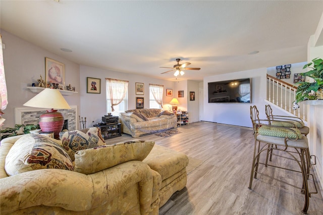 1414 Stevens Ct, Rosenberg, TX 77471 - living room with stairs, wood finished floors, and ceiling fan