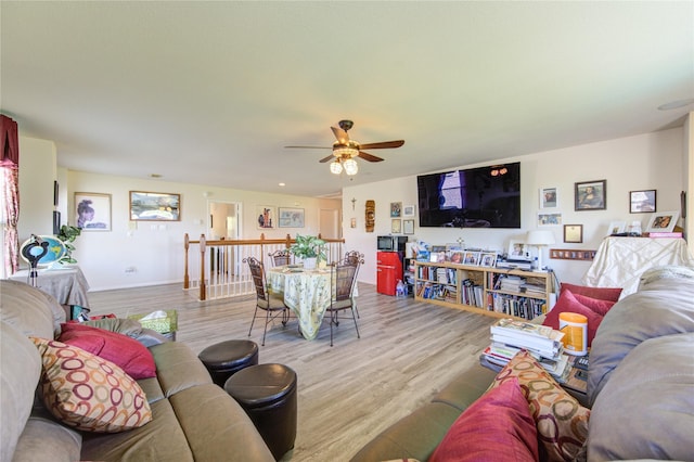 1414 Stevens Ct, Rosenberg, TX 77471 - living area featuring ceiling fan and wood finished floors