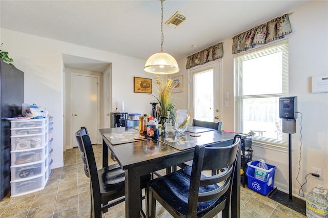 1414 Stevens Ct, Rosenberg, TX 77471 - dining area featuring plenty of natural light and baseboards