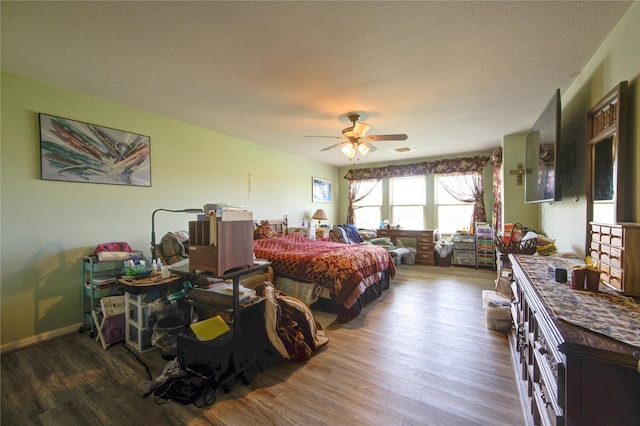 1414 Stevens Ct, Rosenberg, TX 77471 - bedroom featuring wood finished floors and a ceiling fan