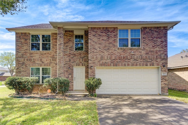 1414 Stevens Ct, Rosenberg, TX 77471 - view of front of home with brick siding, driveway, a garage, and a front yard