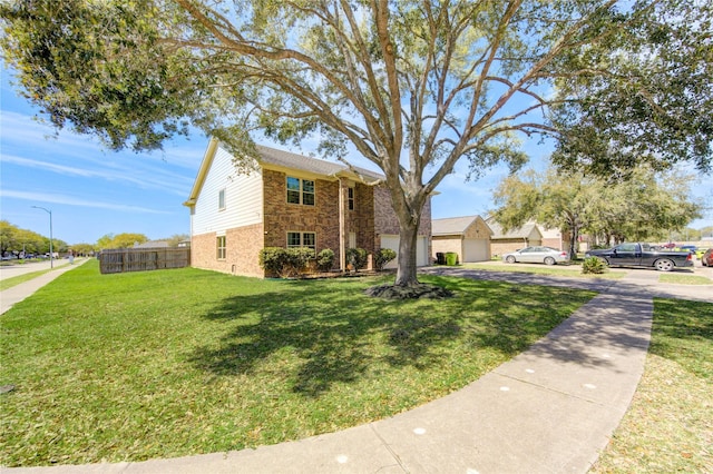 1414 Stevens Ct, Rosenberg, TX 77471 - traditional-style house featuring a garage, brick siding, and stone siding