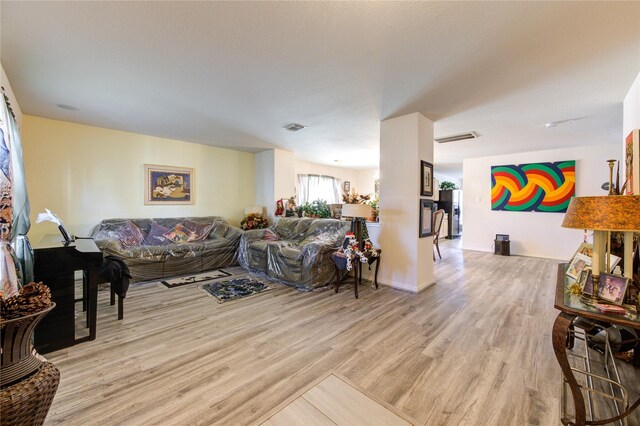 1414 Stevens Ct, Rosenberg, TX 77471 - living area featuring light wood finished floors