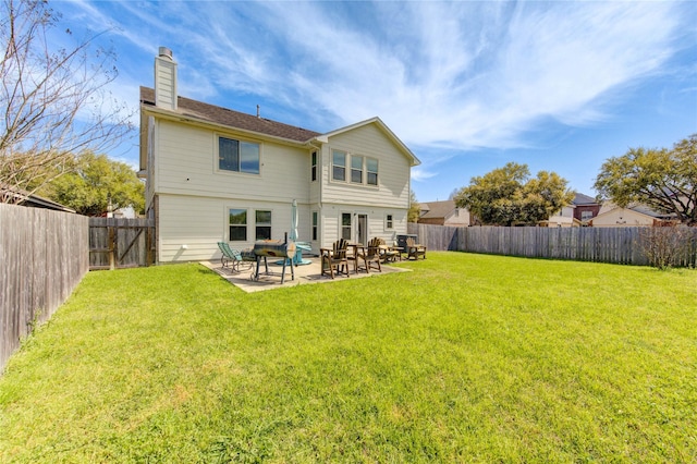 1414 Stevens Ct, Rosenberg, TX 77471 - back of house with a chimney and a patio area