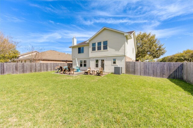 1414 Stevens Ct, Rosenberg, TX 77471 - back of house with central AC, a chimney, and a patio