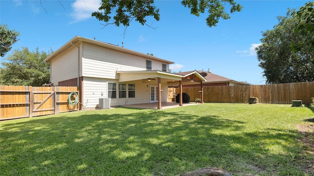 5923 W Harrow Dr, Houston, TX 77084 - rear view of house with a ceiling fan, a fenced backyard, a patio area, and a gate