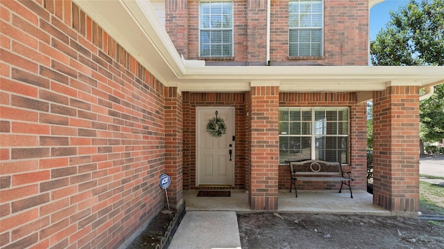 5923 W Harrow Dr, Houston, TX 77084 - doorway to property with brick siding