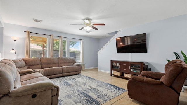 5923 W Harrow Dr, Houston, TX 77084 - living area featuring light tile patterned flooring and a ceiling fan