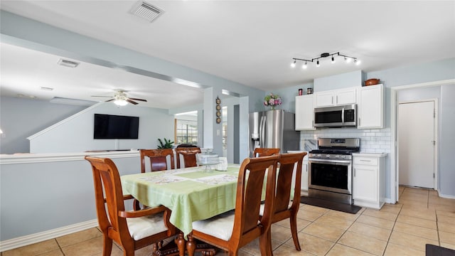 5923 W Harrow Dr, Houston, TX 77084 - dining room with light tile patterned floors and a ceiling fan