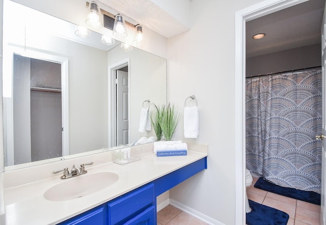 18143 Bal Harbour Dr, Houston, TX 77058 - bathroom with tile patterned flooring, toilet, and vanity