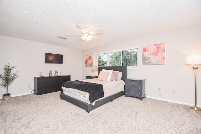 18143 Bal Harbour Dr, Houston, TX 77058 - bedroom featuring carpet floors, a textured ceiling, baseboards, and ceiling fan