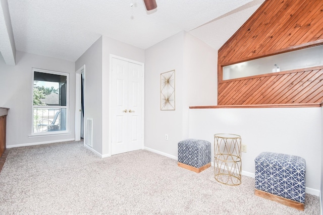 18143 Bal Harbour Dr, Houston, TX 77058 - sitting room with vaulted ceiling, carpet flooring, ceiling fan, and baseboards