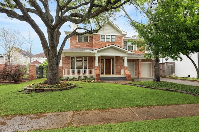 5302 Huisache St, Bellaire, TX 77401 - view of front of home featuring brick siding, driveway, and a porch