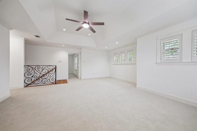 5302 Huisache St, Bellaire, TX 77401 - spare room featuring recessed lighting, light colored carpet, ceiling fan, a raised ceiling, and baseboards