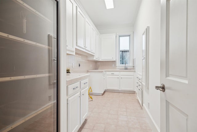 5302 Huisache St, Bellaire, TX 77401 - washroom featuring a sink