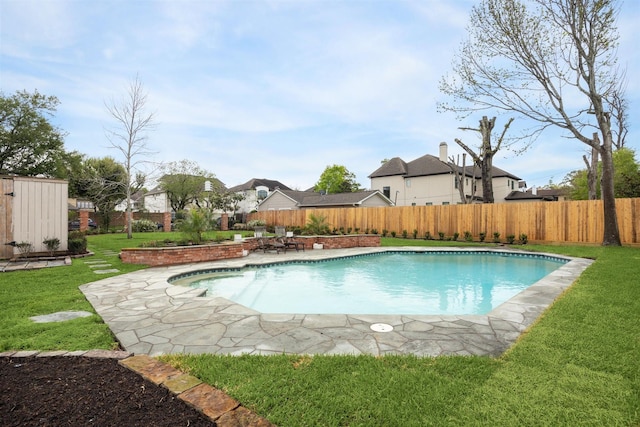 5302 Huisache St, Bellaire, TX 77401 - view of swimming pool featuring a patio area, an outbuilding, and a storage unit