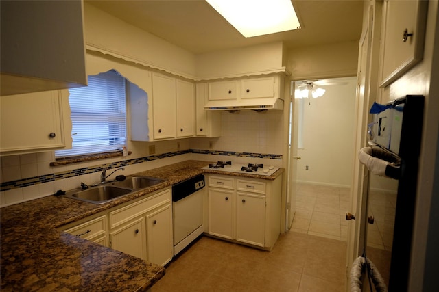 12323 Bexley Dr, Houston, TX 77099 - kitchen featuring white appliances, tasteful backsplash, white cabinetry, a sink, and light tile patterned floors