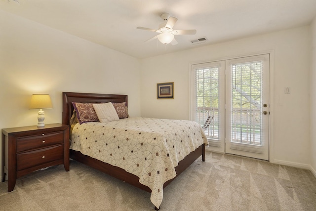 3303 Quiet Lake Dr, Katy, TX 77450 - carpeted bedroom featuring access to exterior, multiple windows, ceiling fan, and baseboards