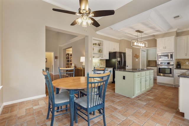 3303 Quiet Lake Dr, Katy, TX 77450 - dining space featuring a ceiling fan, crown molding, and baseboards