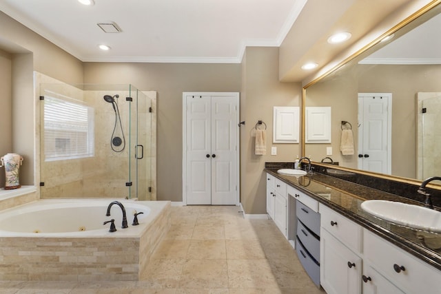 3303 Quiet Lake Dr, Katy, TX 77450 - full bath featuring a whirlpool tub, a shower stall, double vanity, ornamental molding, and baseboards