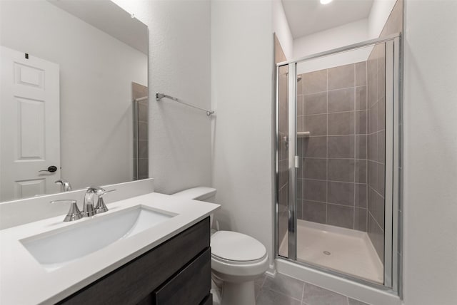 2897 Shimmer Edge Dr, Katy, TX 77493 - full bath with a shower stall, tile patterned flooring, toilet, and vanity