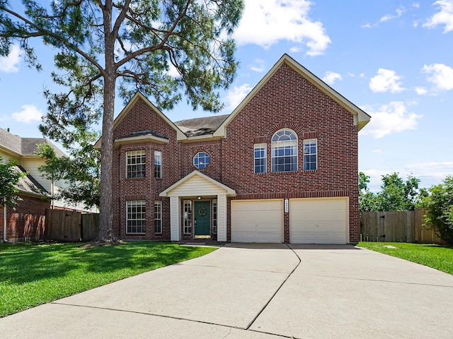 view of front of home with brick siding, concrete driveway, and a garage