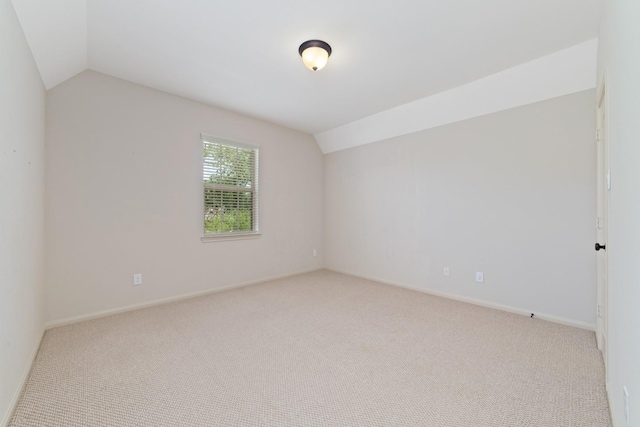 5422 Dalton Ranch Ln, Sugar Land, TX 77479 - unfurnished room with lofted ceiling, light carpet, and baseboards