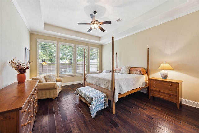 17715 Netherby Ln, Richmond, TX 77407 - bedroom featuring a tray ceiling, baseboards, dark wood-style flooring, and ceiling fan