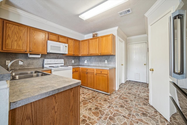17022 Scuttle Way, Crosby, TX 77532 - kitchen with white appliances, a sink, light stone finish floors, backsplash, and ornamental molding