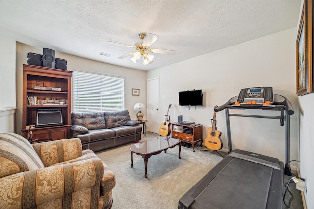 17022 Scuttle Way, Crosby, TX 77532 - carpeted living area with a ceiling fan and a textured ceiling