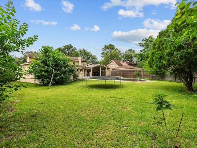 10218 Sagerock Dr, Houston, TX 77089 - view of yard with a trampoline