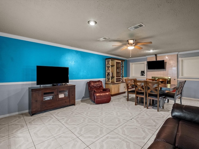 10218 Sagerock Dr, Houston, TX 77089 - living area with ornamental molding, ceiling fan, and a textured ceiling