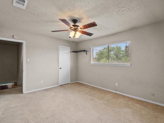 10218 Sagerock Dr, Houston, TX 77089 - unfurnished bedroom featuring carpet, baseboards, and a textured ceiling