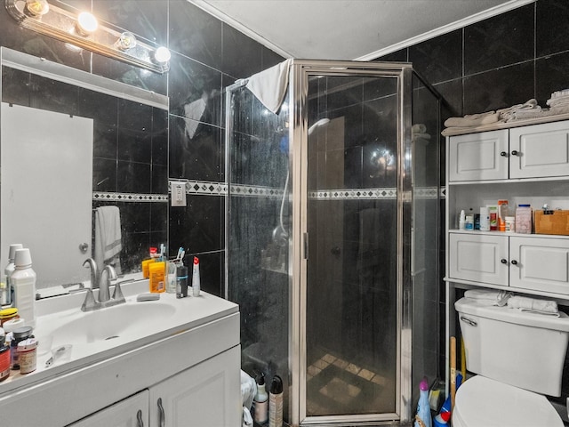 10218 Sagerock Dr, Houston, TX 77089 - full bath with tile walls, a shower stall, vanity, and toilet
