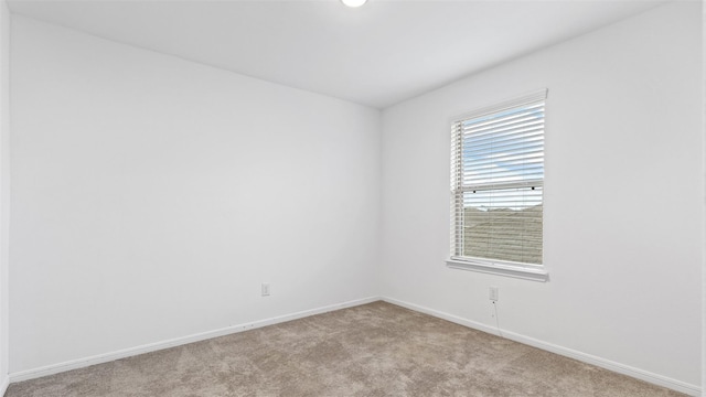 321 Lippizan Dr, Alvin, TX 77511 - empty room with carpet and baseboards