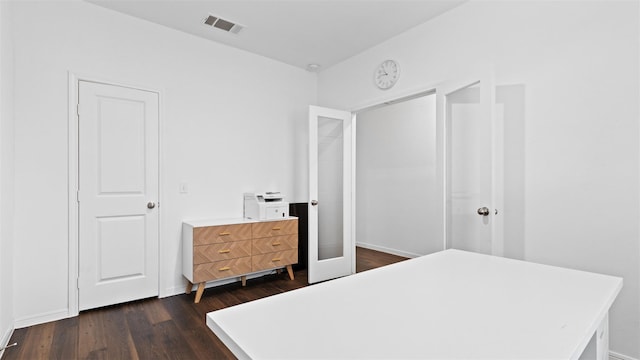 321 Lippizan Dr, Alvin, TX 77511 - bedroom featuring dark wood-type flooring and baseboards