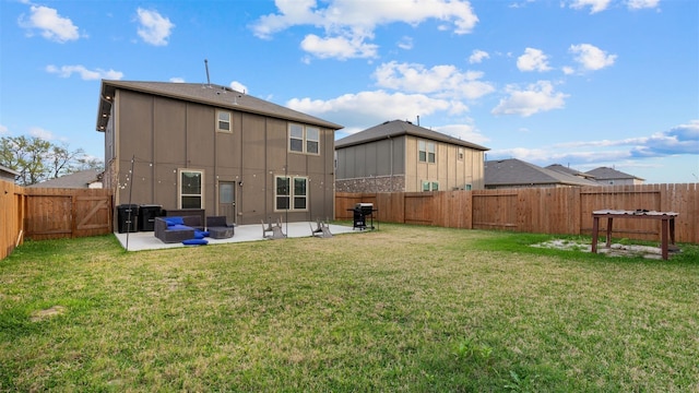 321 Lippizan Dr, Alvin, TX 77511 - back of house with a patio and a gate