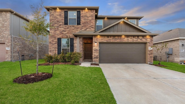 321 Lippizan Dr, Alvin, TX 77511 - view of front of home with board and batten siding, concrete driveway, brick siding, and a yard