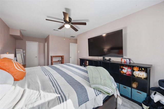 7906 Beaufort Dr, Spring, TX 77379 - carpeted bedroom with a ceiling fan