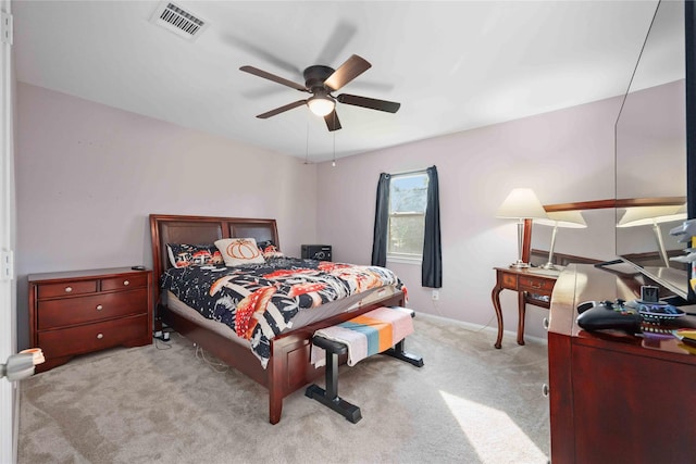 7906 Beaufort Dr, Spring, TX 77379 - carpeted bedroom with baseboards and ceiling fan