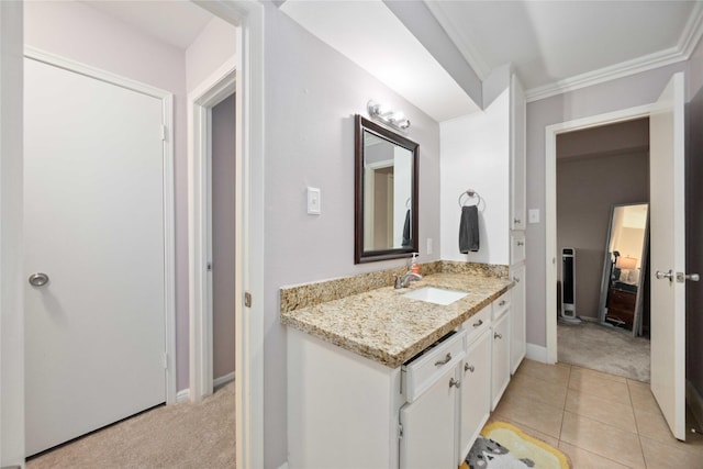 7906 Beaufort Dr, Spring, TX 77379 - bathroom with vanity, baseboards, ornamental molding, and tile patterned floors