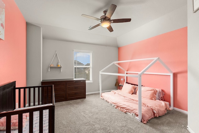 bedroom with carpet floors, baseboards, and ceiling fan
