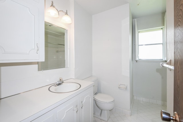 1902 S Memorial Ct, Pasadena, TX 77502 - full bathroom featuring toilet, vanity, and tile patterned floors