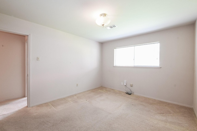 1902 S Memorial Ct, Pasadena, TX 77502 - empty room with light carpet and baseboards