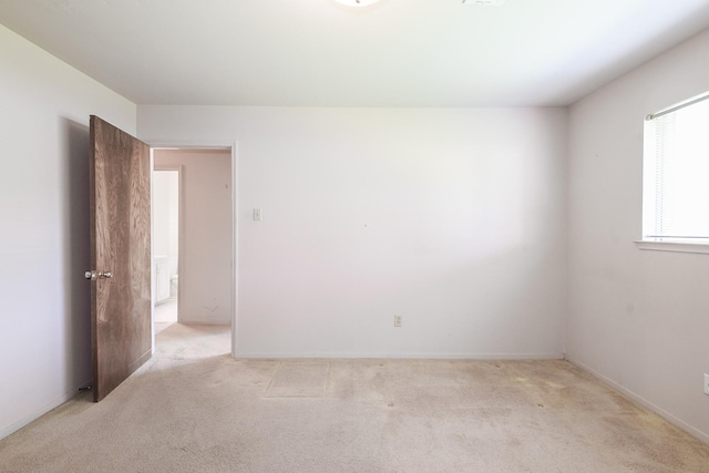 1902 S Memorial Ct, Pasadena, TX 77502 - unfurnished room featuring light carpet and baseboards
